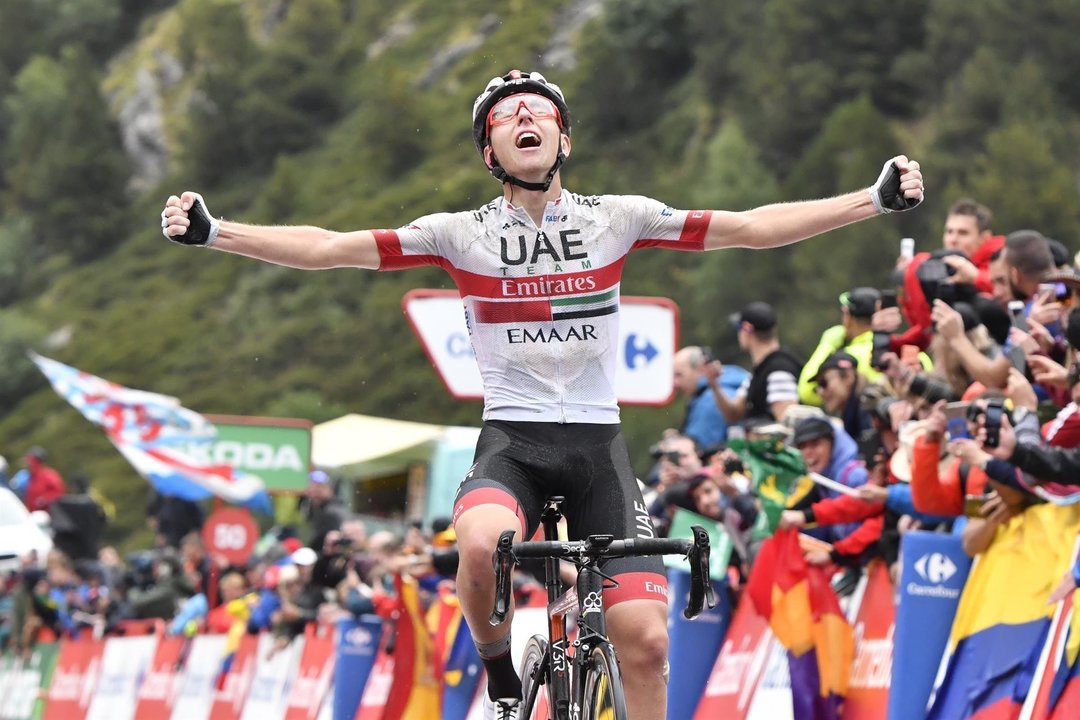 01 September 2019, Spain, Ctra. dels Cortals d'Encamp: Slovenian cyclist Tadej Pogacar of UAE Team Emirates celebrates as he crosses the finish line to win the ninth stage of the 2019 edition of the "Vuelta a Espana" Tour of Spain cycling race, 94,4 km fr