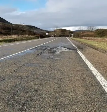 Da&ntilde;os en la N-611 por los temporales de nieve.