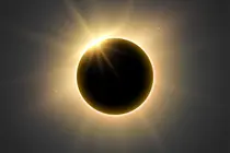 beautiful full solar eclipse with bright rays for spiritual energy vector