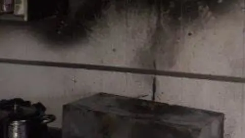 Fuego en una campana extractora