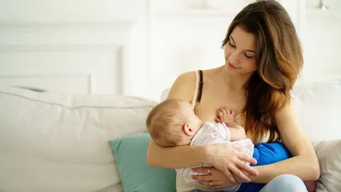 breastfeed, motherhood, Mothers day, family love. mom breastfeeding her little son. breast feeding, lactation, maternity and healthy lifestyle (breastfeed, motherhood, Mothers day, family love. mom breastfeeding her little son. breast feeding, lactati