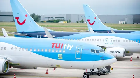 FILED - 15 June 2020, Lower Saxony, Langenhagen: Aircraft belonging to the airline TUIfly park at Hannover Airport. Photo: Hauke-Christian Dittrich/dpa
