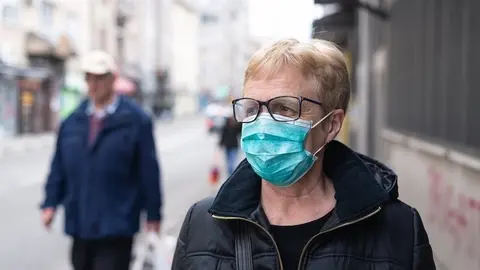 Woman protecting from virus.. Virus. Virus protection mask. Corona virus. Concept of virus protection. Sick people with mask. People with mask. Senior woman with mask. Mask against corona virus. Woman portrait with mask. (Woman protecting from virus..