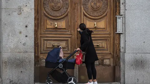 Citizens continue to shop and walk their pets during confinement during thetennth day after the Government declared the state of alarm in Spain and recommended people to stay at home to fight coronavirus COVID-19 on March 30, 2020 in Madrid, Spain