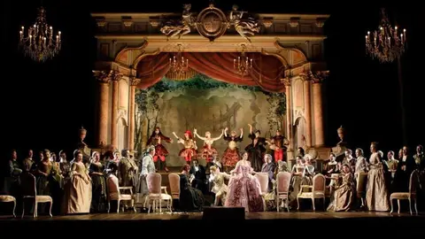 The end of the ballet in Act III with Angela Gheorghiu as Adriana in the foreground of the Royal Opera production of Adriana Lecouvreur by Francesco Cilea (1866-1950) directed by David McVicar  with set designs by Charles Edwards, costume designs by Brigitte Reiffenstuel and lighting designs by Adam Silverman, performed at the Royal Opera House, Covent Garden in November 2010.

ARPDATA ; 

ADRIANA LECOUVREUR ;

Music by Cilea ;

The end of the ballet in Act III, Angela Gheorghiu (as Adriana Lecouvreur) ; 

The Royal Opera ; 

At the Royal Opera House, London, UK ; 

November 2010 ; 

Credit: Catherine Ashmore / Royal Opera House / ArenaPAL ;